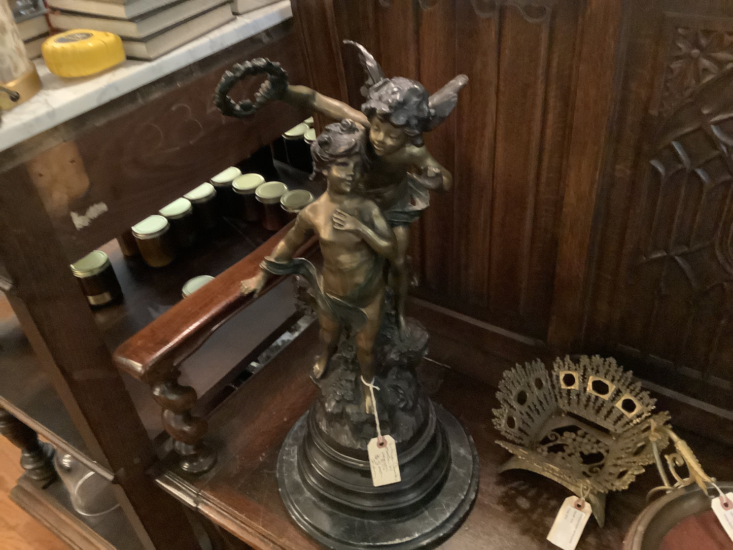 256. Vintage cherubs statues with crown