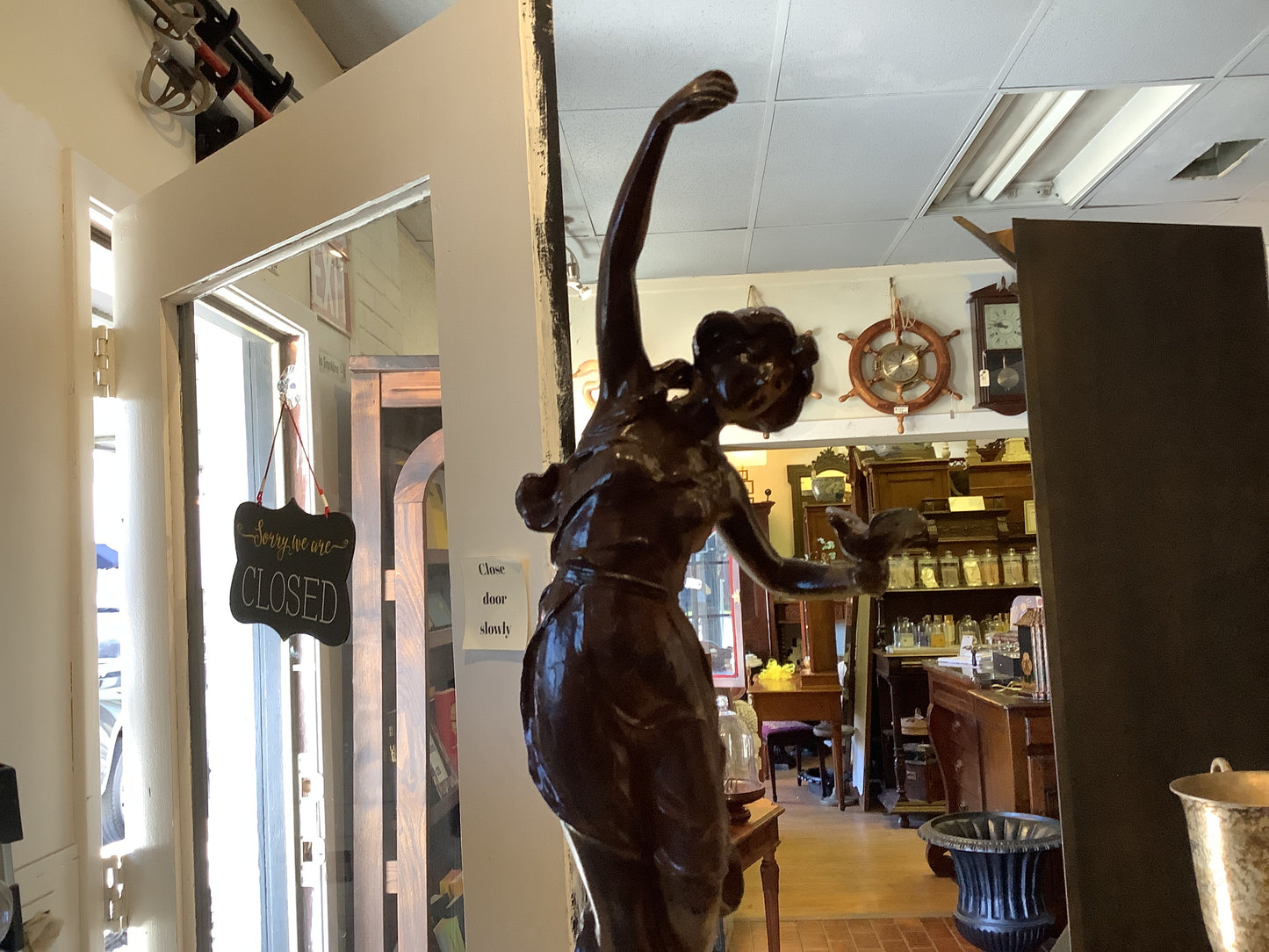1040. Spelter women w/dove