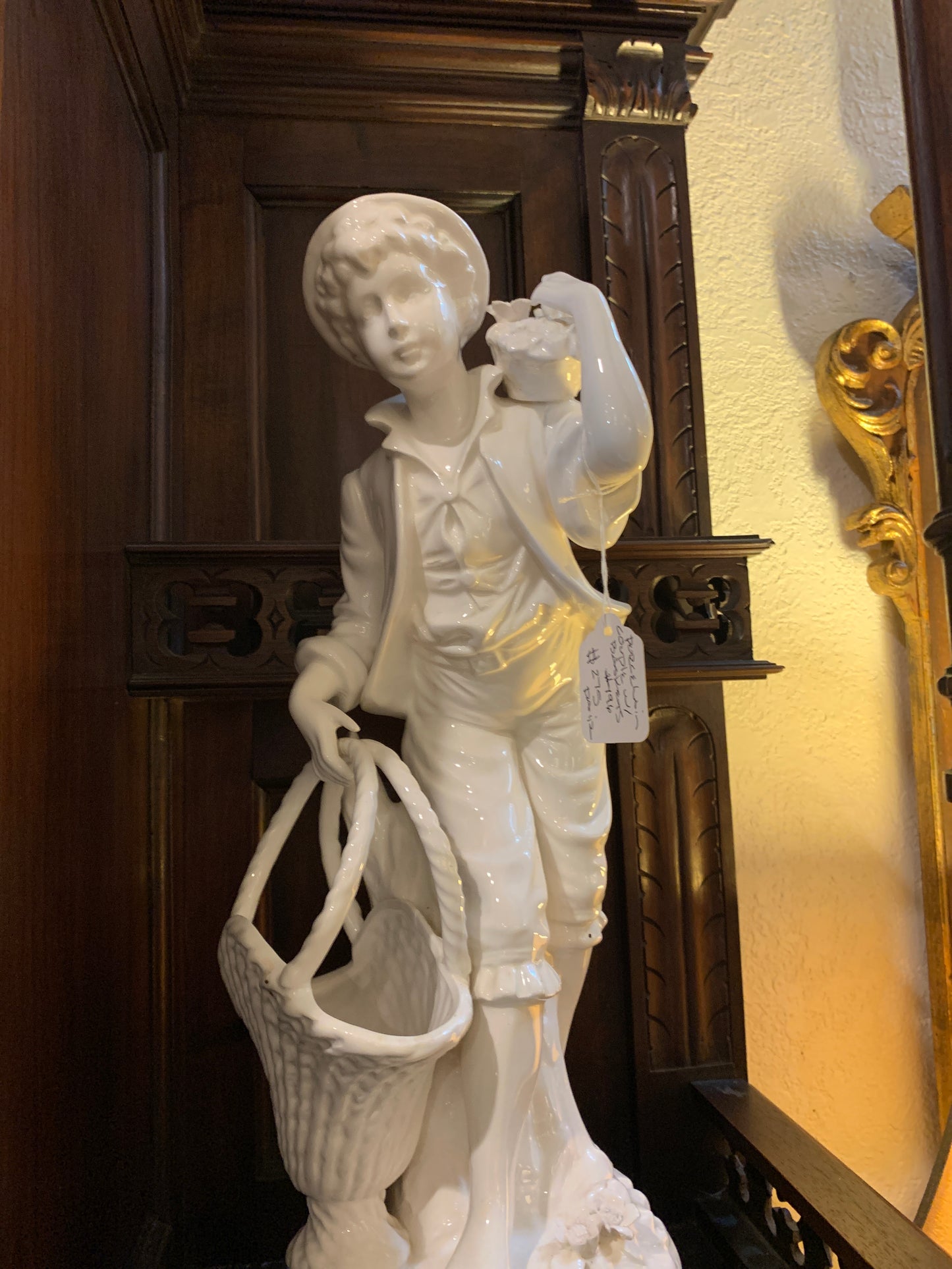 196. Porcelain couple w/basket