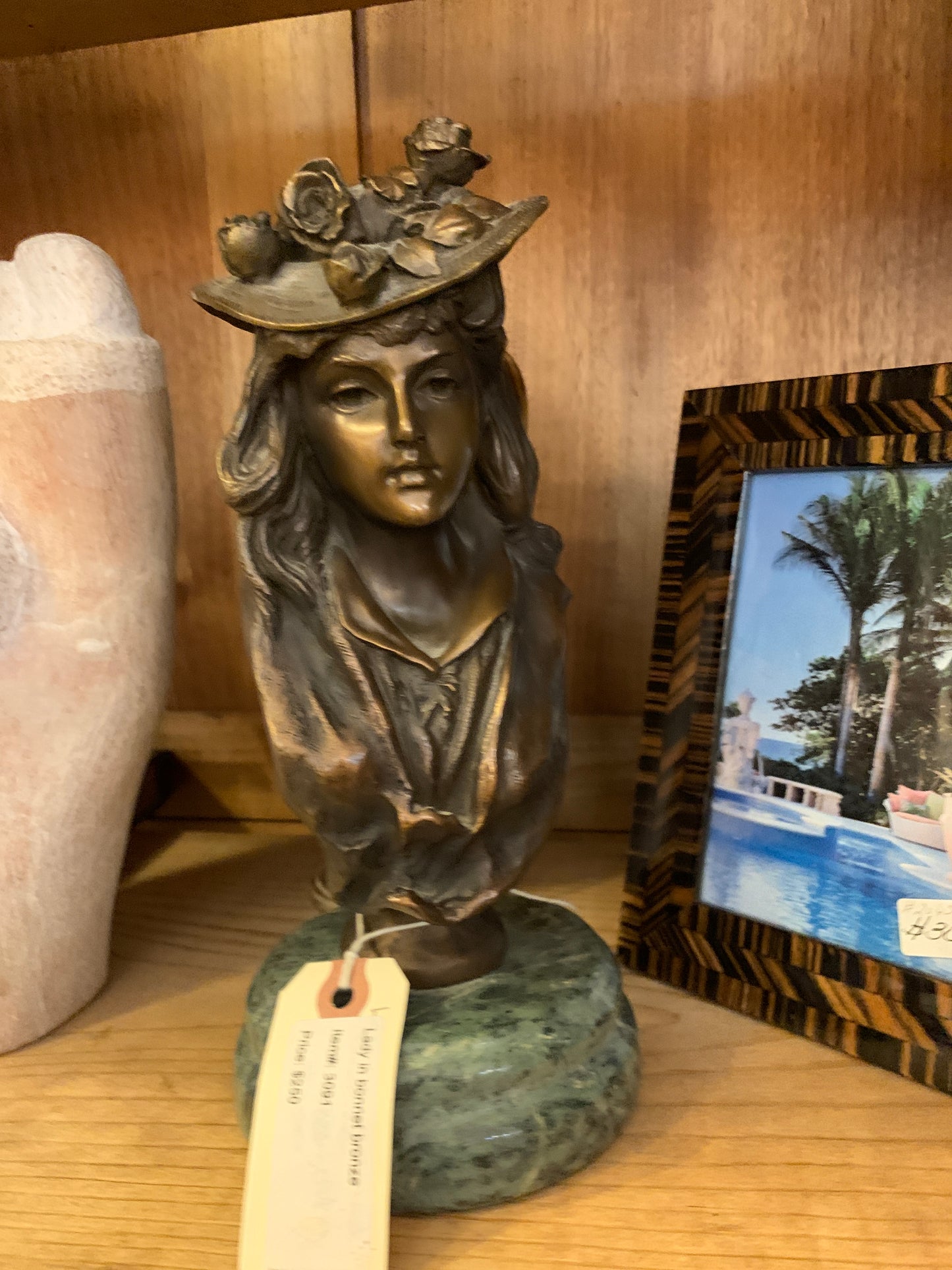 3091. Lady in bonnet bronze