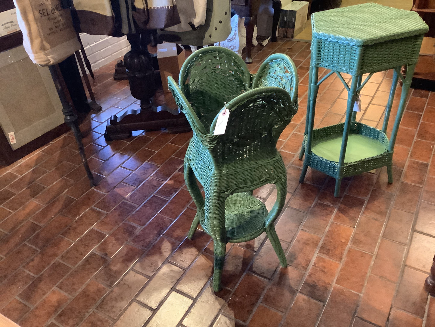 634. Green wicker plant stand