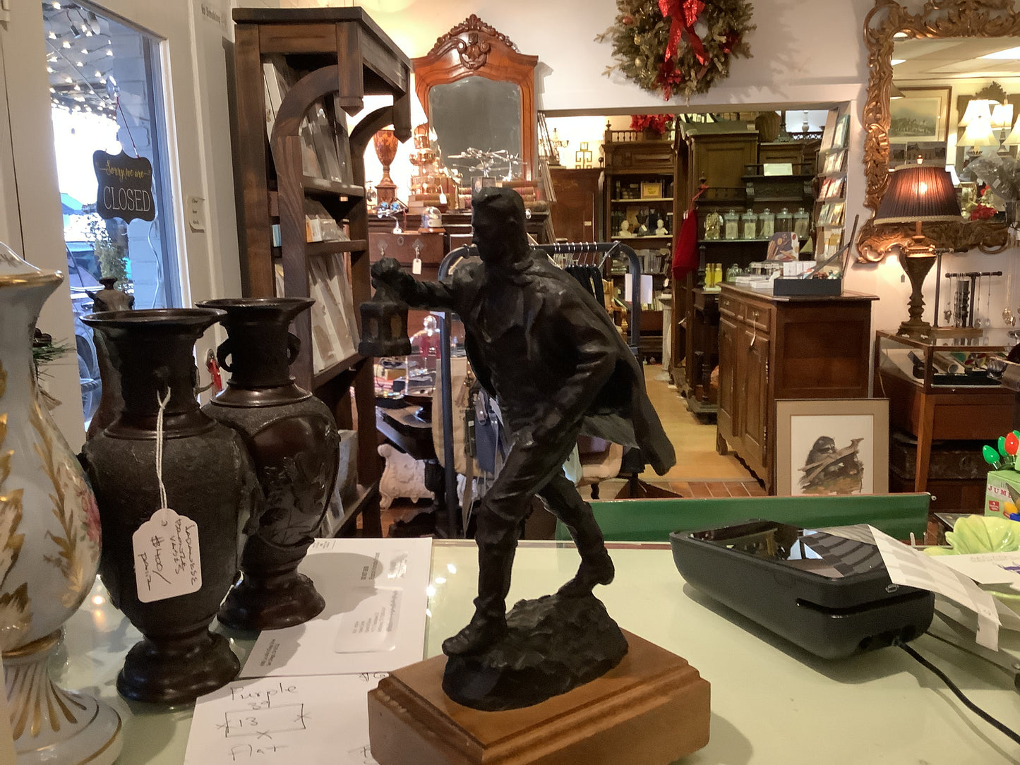 1161. D. Crow statue
