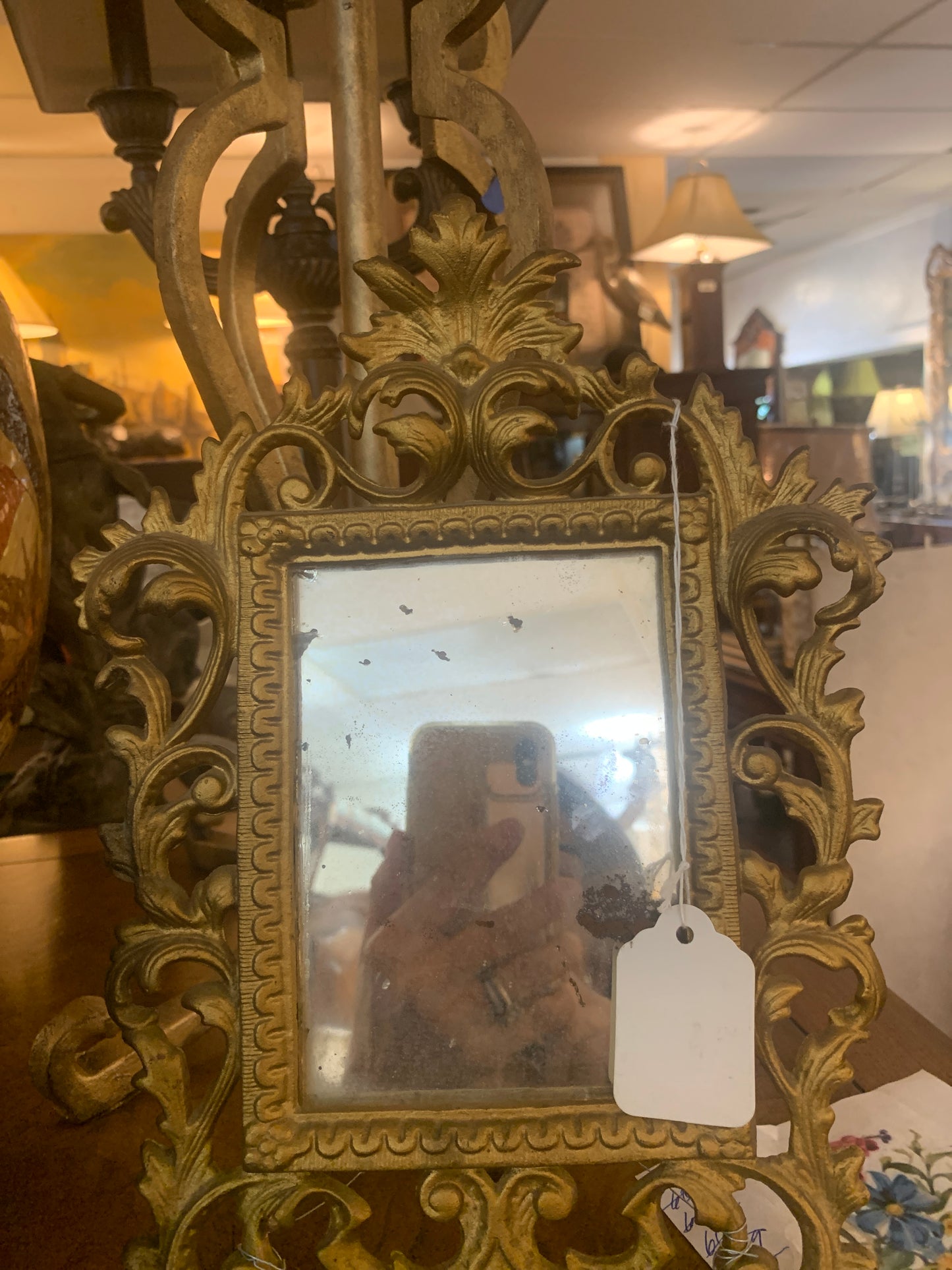 627. Ornate metal mirror