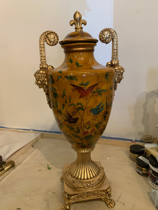 Gold bird motif urns