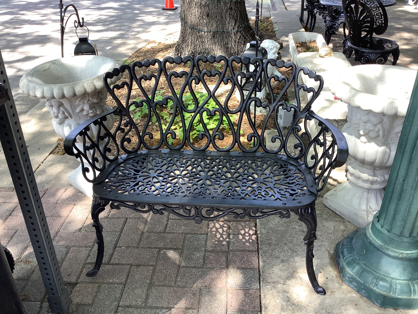 102. Black bench w/ chairs