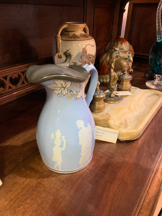 1070. T&R ironstone pewter pitcher