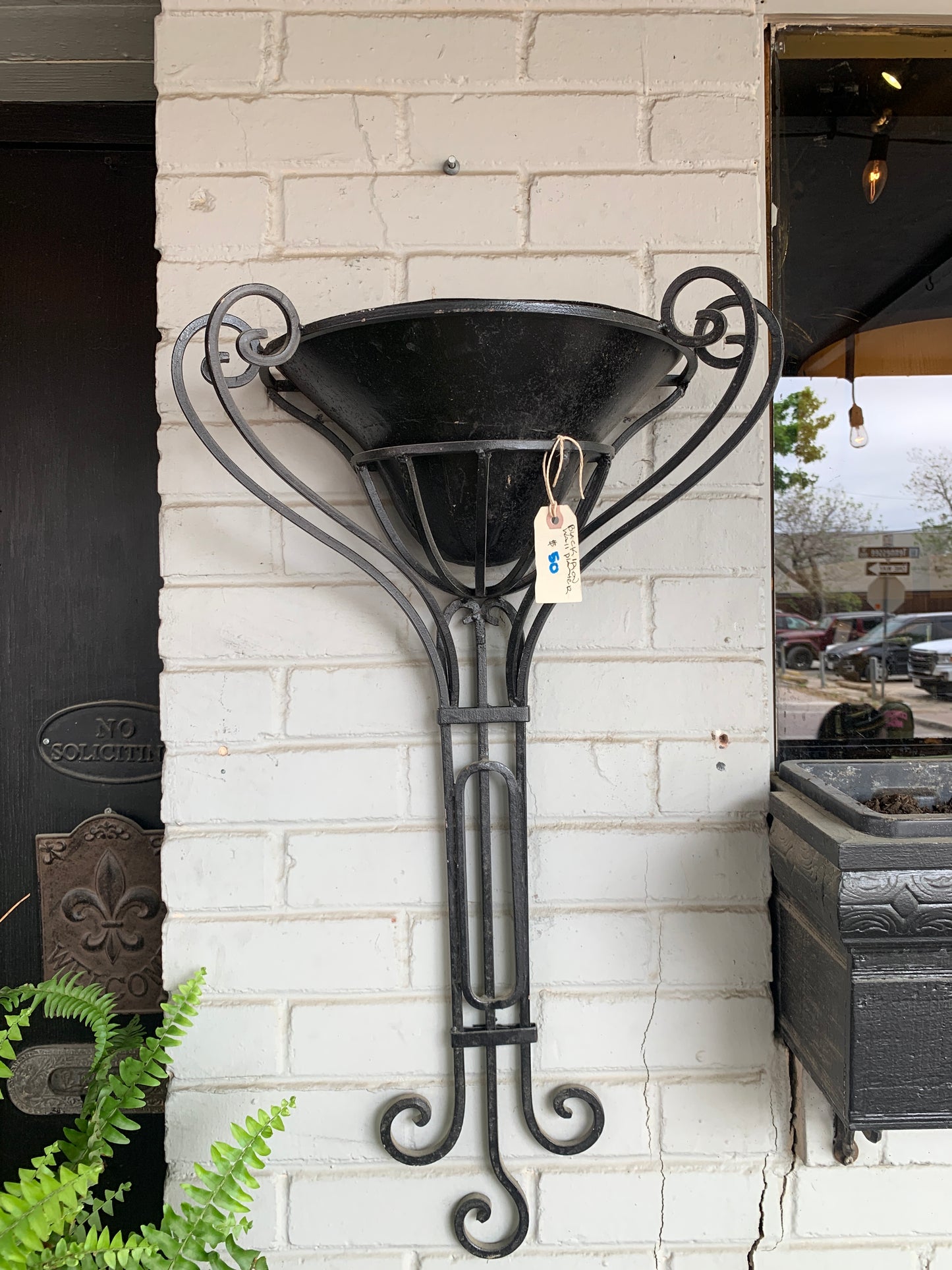 Black iron wall planter