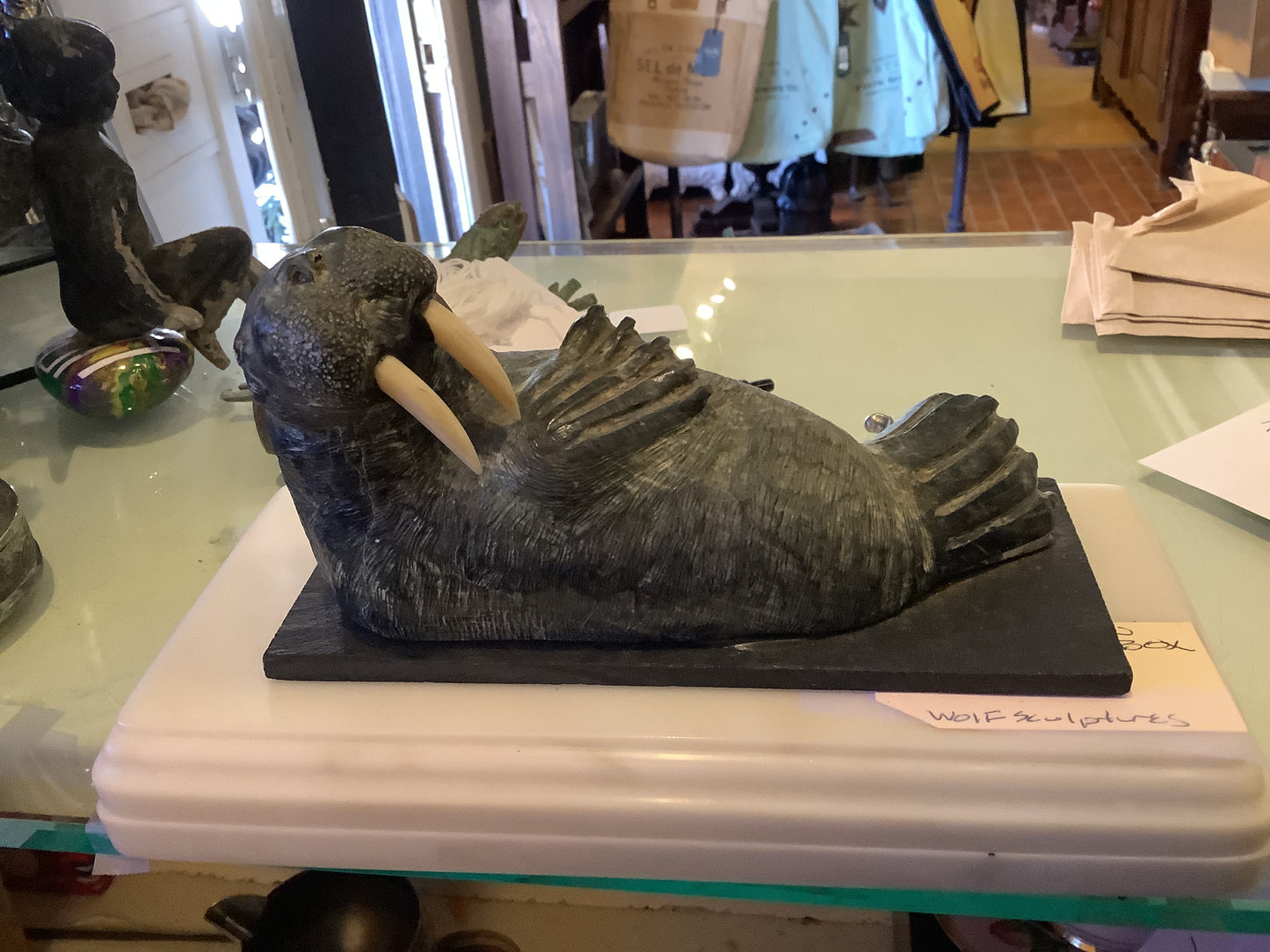 639. Walrus on marble box