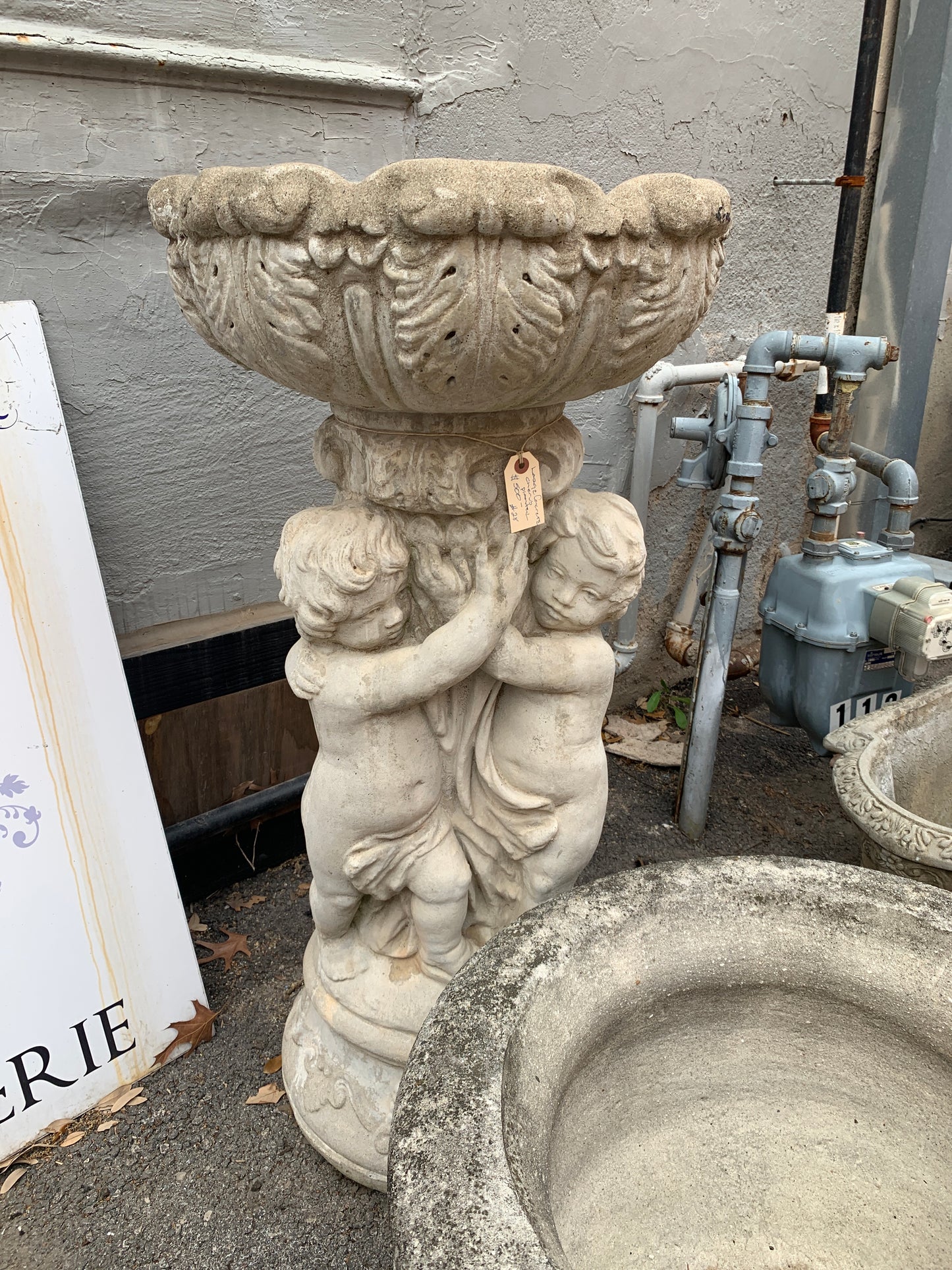 28. Large concrete cherub planter/ fountain