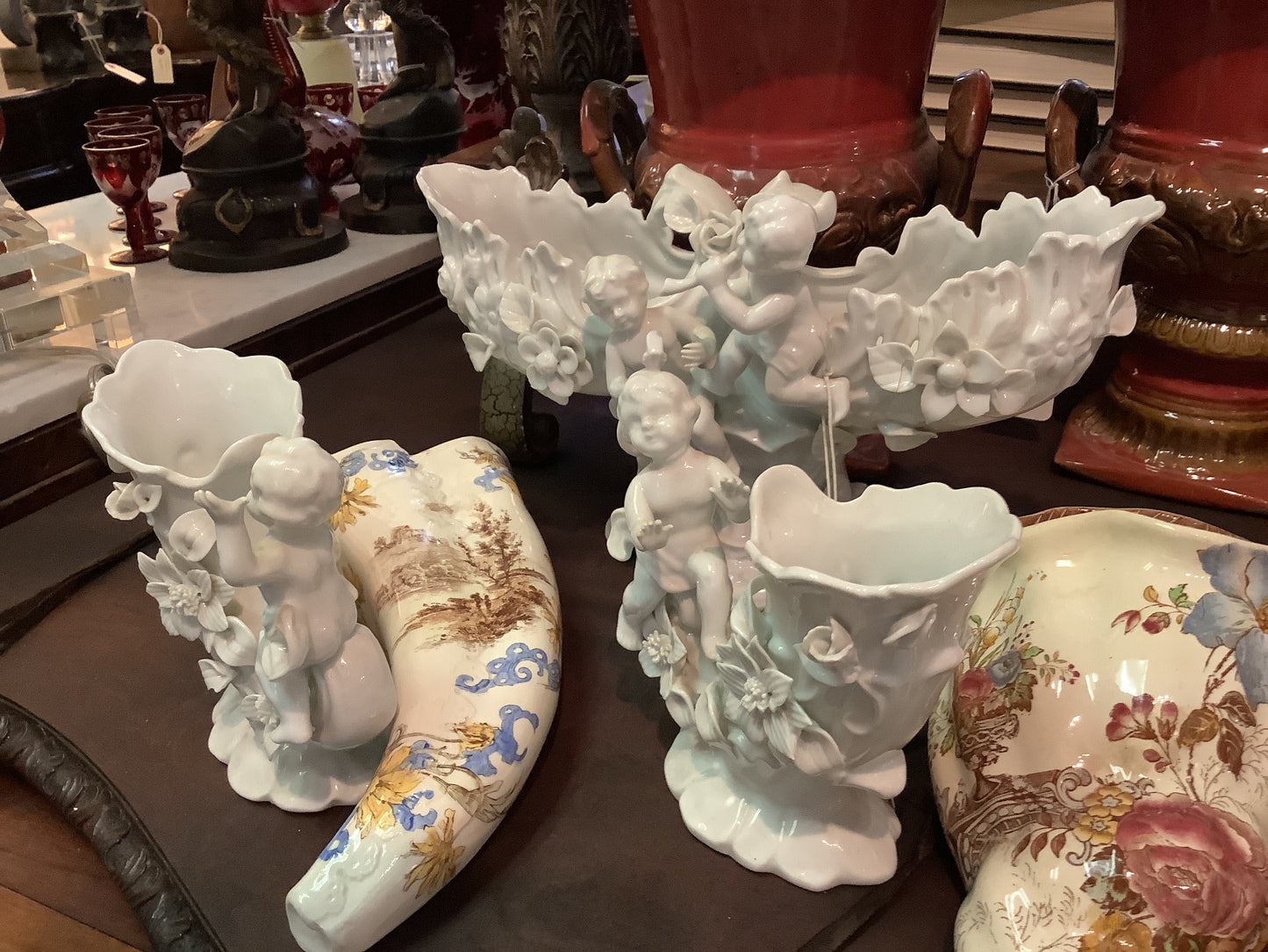 378. 3 porcelain cherubs