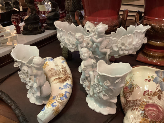 378. 3 porcelain cherubs