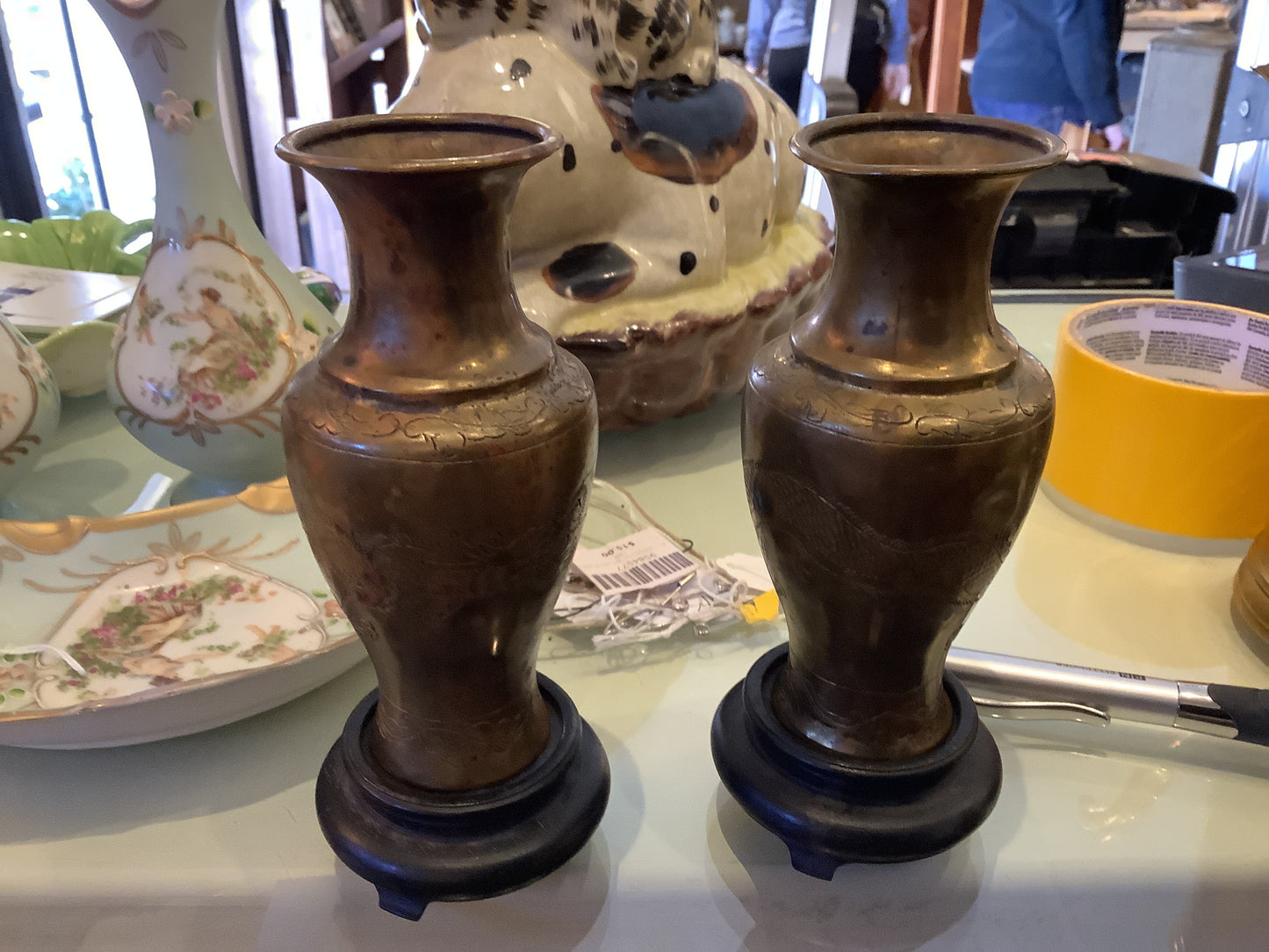 1043. Brass dragon vases on stands