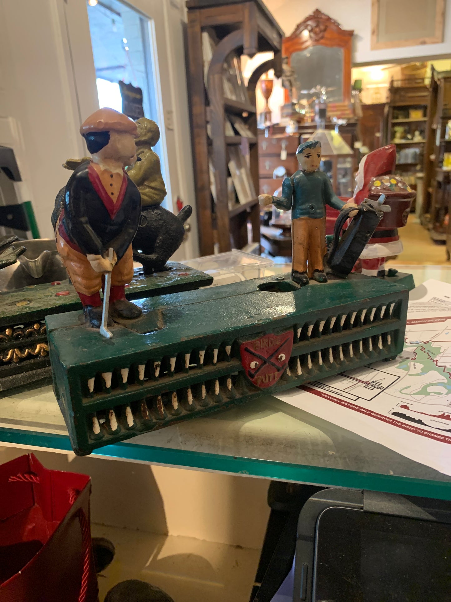 69. Golfer cast iron bank
