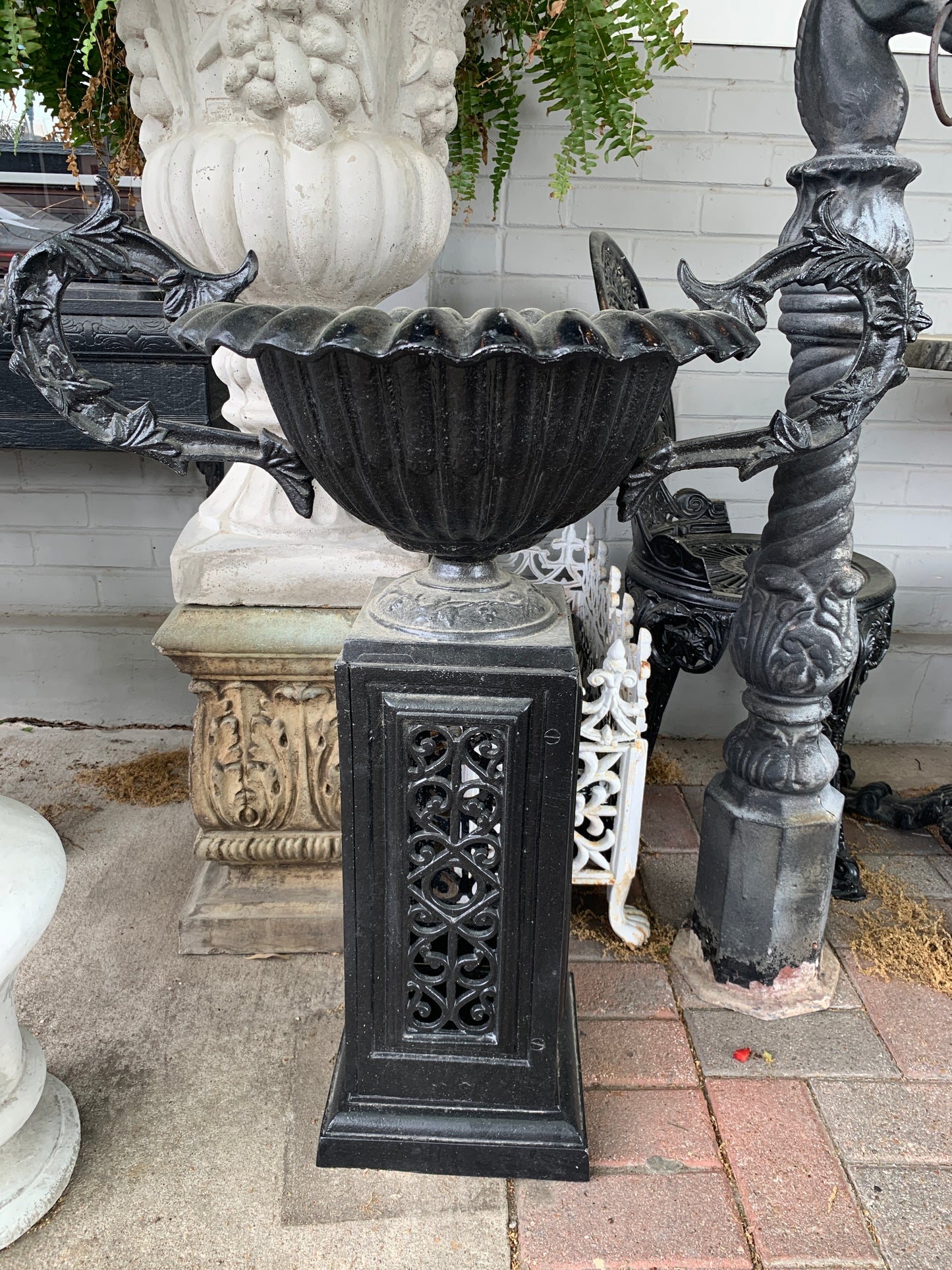 536. Black ornate handled urn