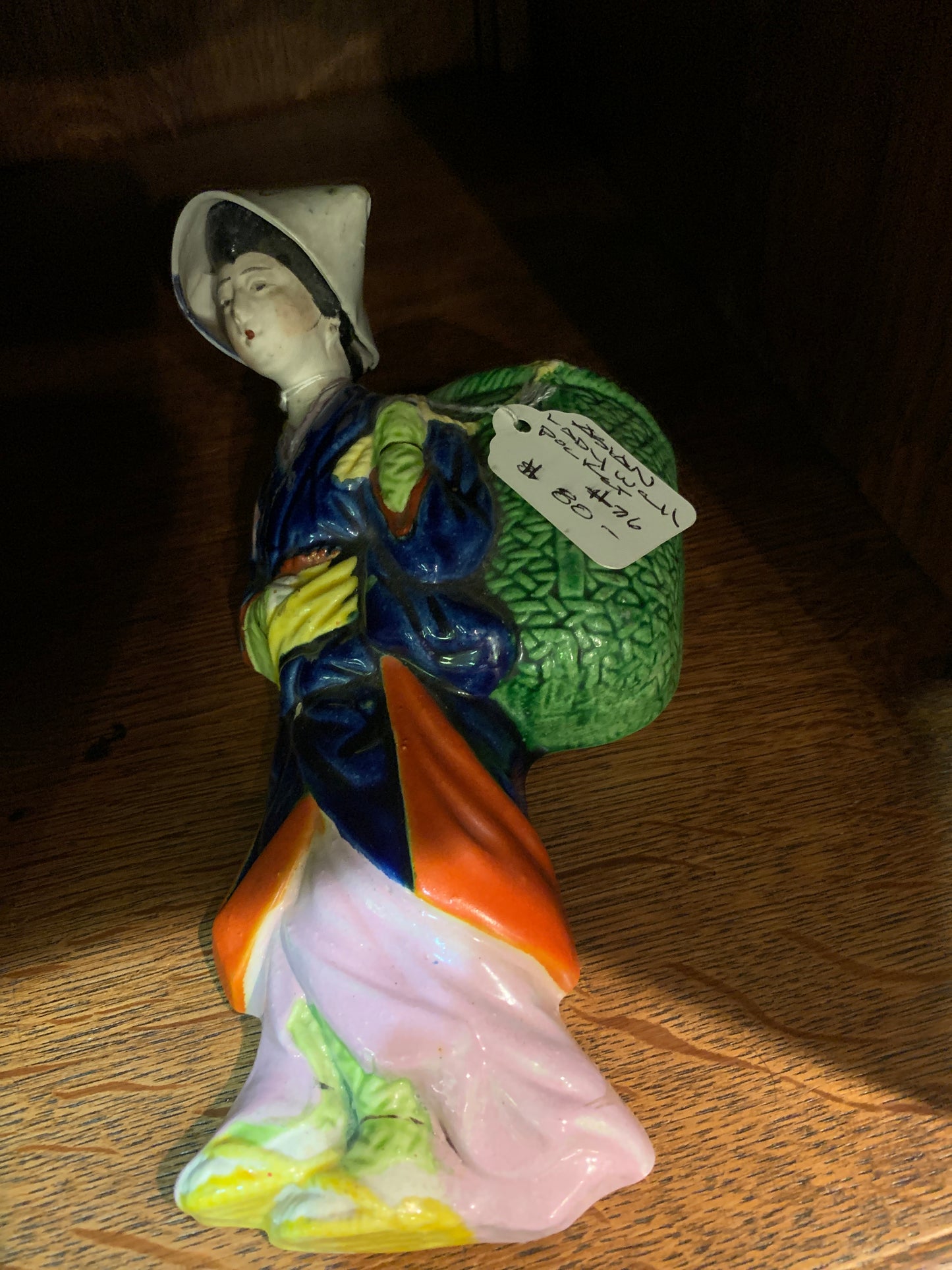716. Asian lady wall pocket