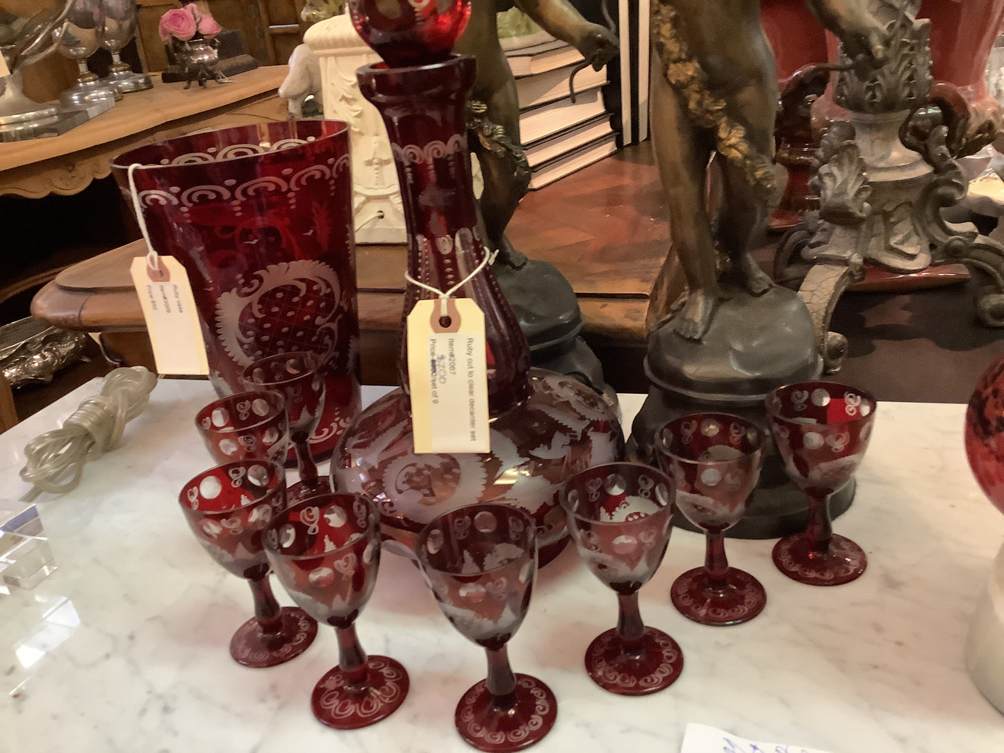 2067. Ruby cut to clear decanter set/9