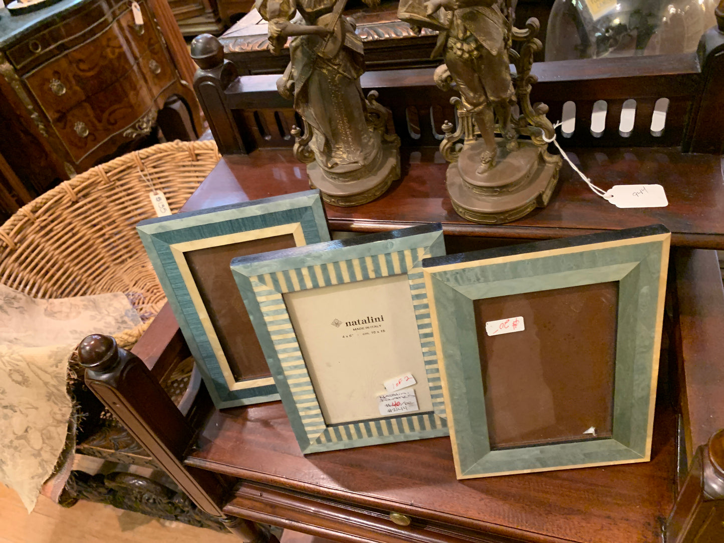 2144. Light green and ivory Natalini frames pair